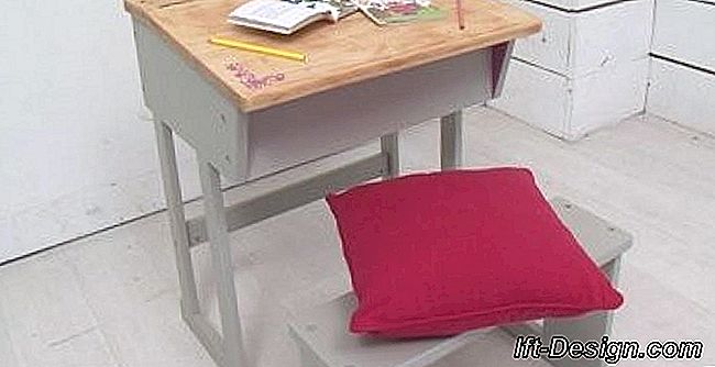 En lyserød og grå piges skrivebord